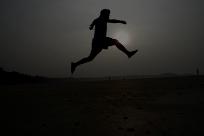 Jumping for joy in Goa's golden sunset glow!